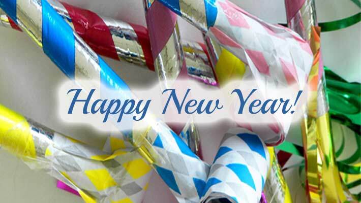Happy New Year. Colorful noisemakers.